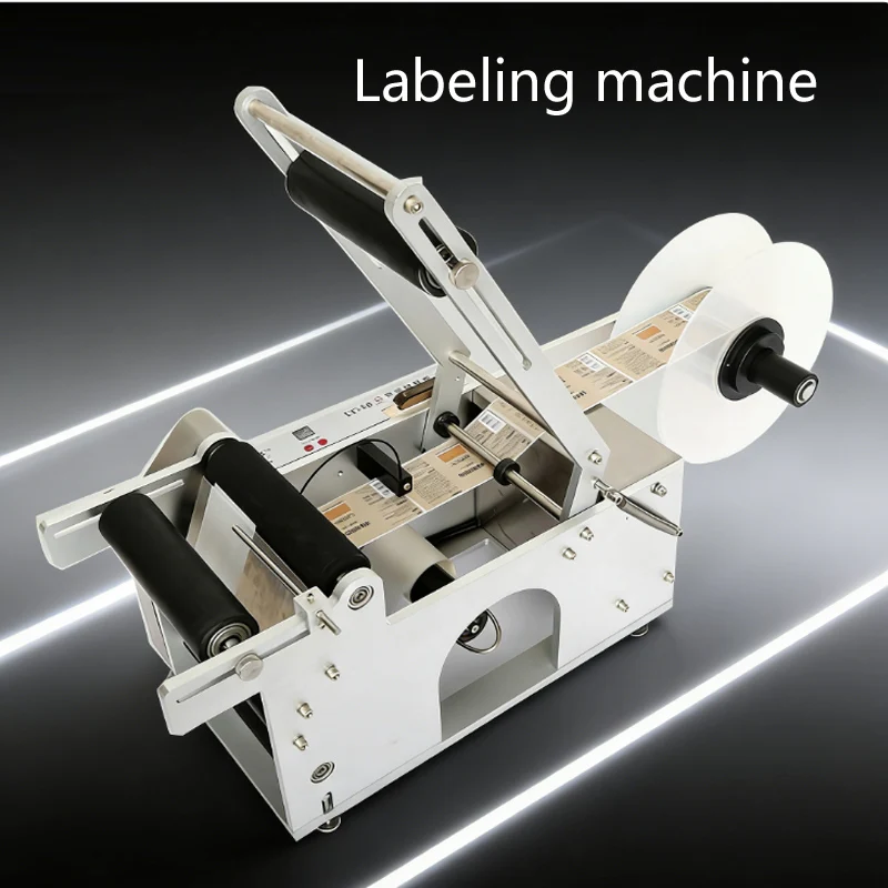 

Настольный автоматический этикетировочный аппарат для плоских бутылочных крышек из нержавеющей стали с самоклеящимися этикетками и регулируемым конвейером