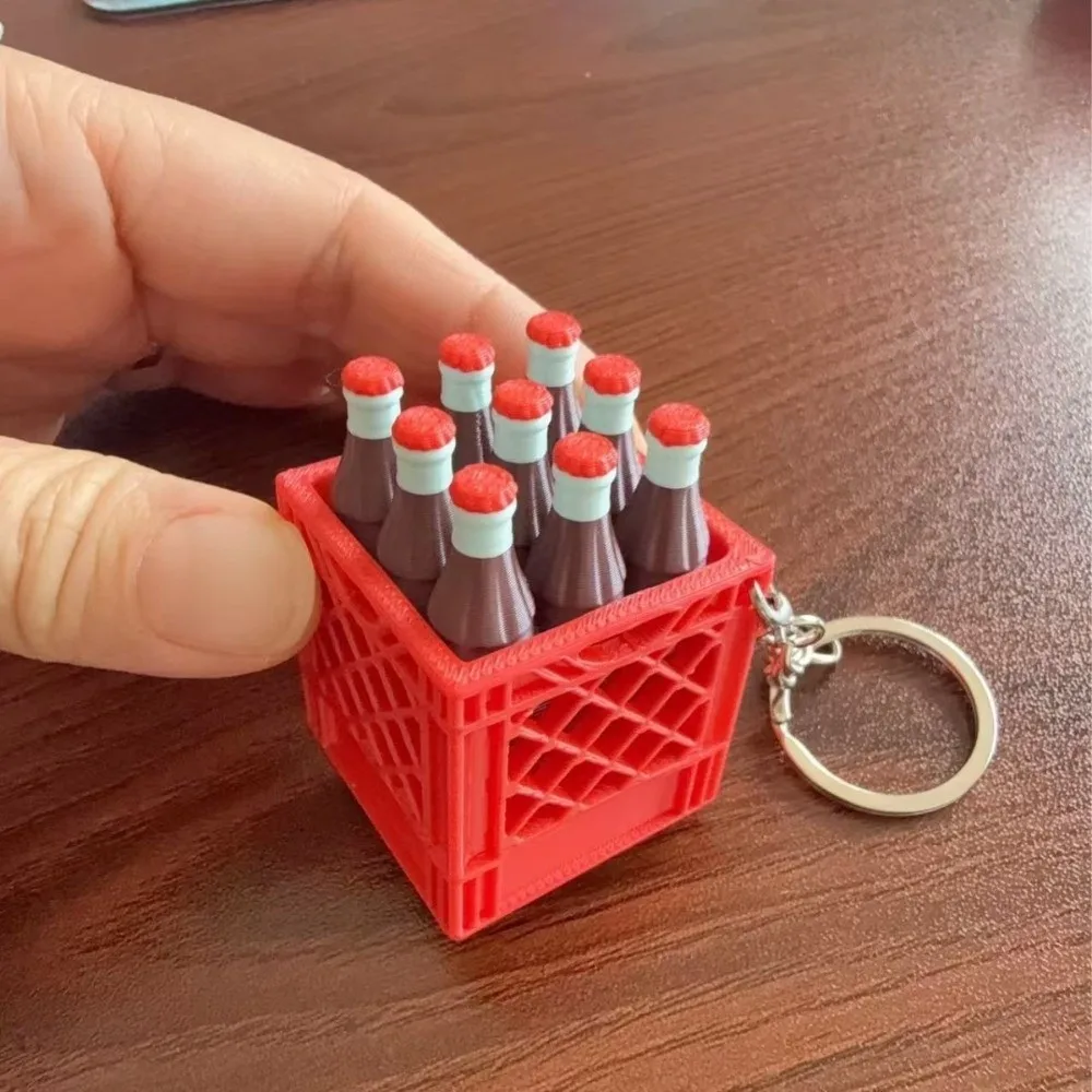 Llavero de plástico divertido con diseño de caja de refresco impresa en 3D, con función de apretar, realista y novedoso, para mochila