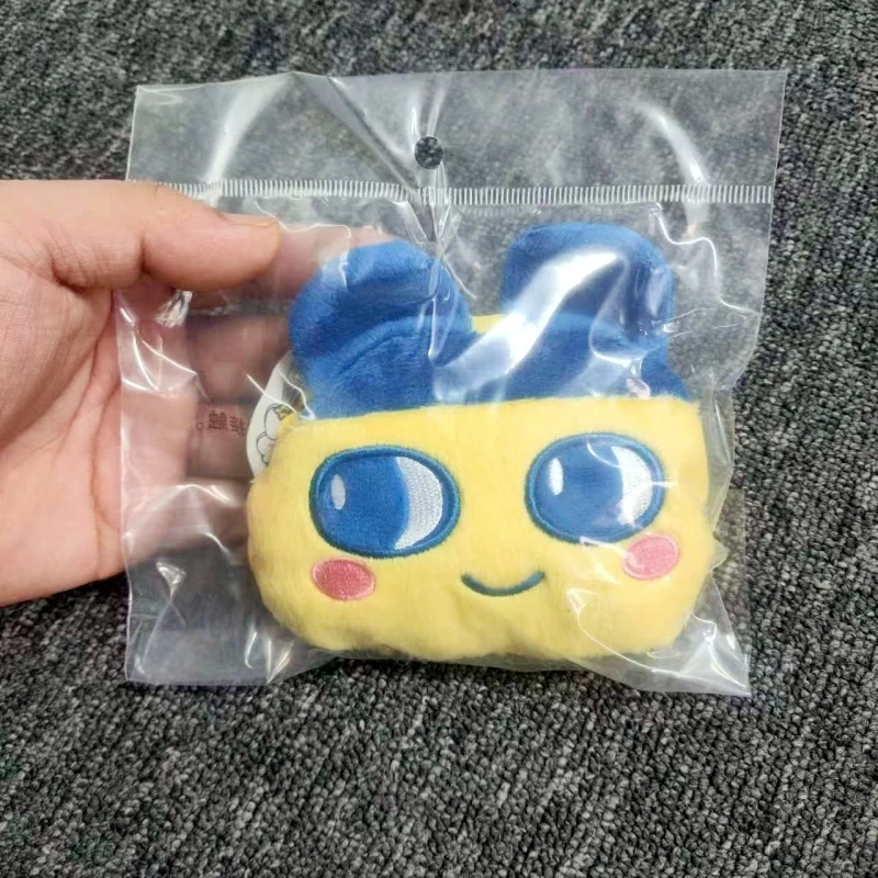 กระเป๋าใส่เหรียญตุ๊กตาตัวละครอนิเมะ ทามาก็อตจิ ของแท้จาก Bandai  น่ารัก พกพาสะดวก เหมาะสำหรับเด็ก ผู้หญิง และแฟนๆ ของขวัญสุดน่ารัก