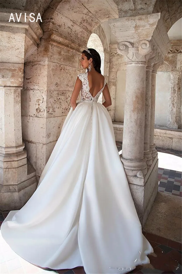 Boho a-line o-collo macchia abito da sposa lunghezza pavimento robe de mariee SweepTrain senza maniche Backless abiti da sposa vestidos de novia