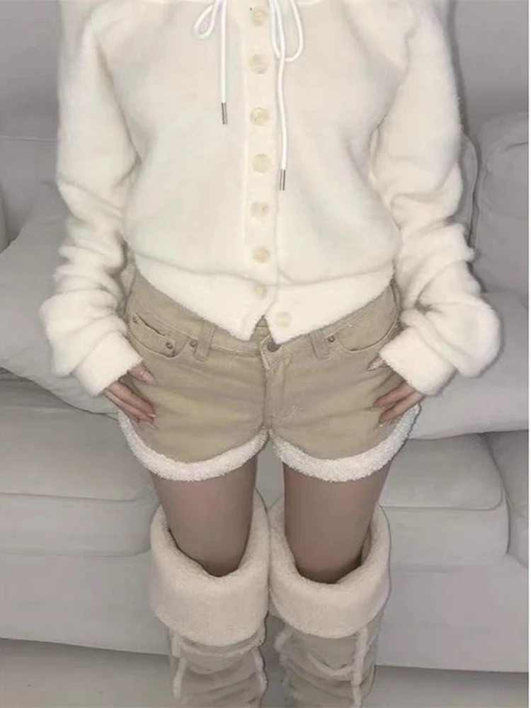 Women's autumn and winter new wrapped buttocks khaki color woolen edge splicing denim shorts versatile trendy short pants
