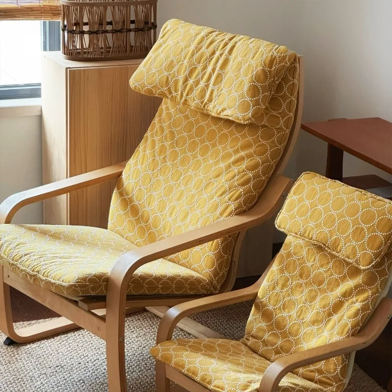 

Armchair cushion, tambourine, rocking chair cushion