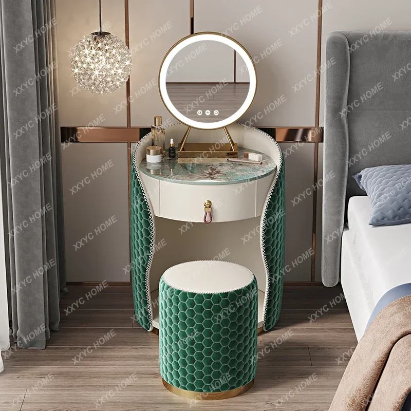 A  Nordic dresser bedroom modern simple round personality small light luxury mini princess makeup table