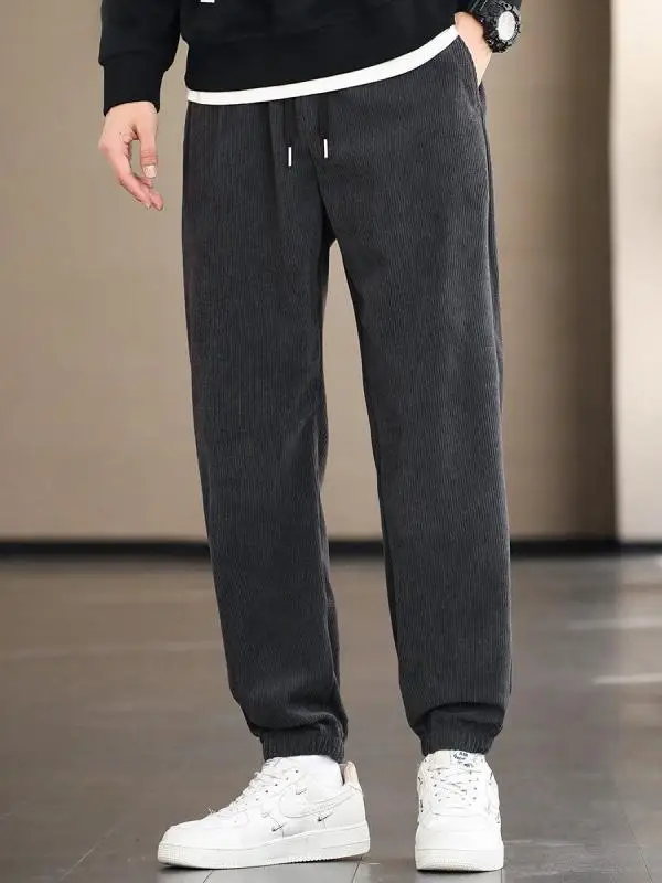 

Удобные мужские повседневные брюки в полоску свободного кроя, модные осенне-весенние спортивные штаны больших размеров с эластичным поясом и манжетами