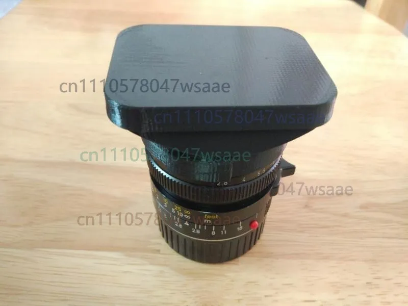 Designed for Leica LEITZ ELMARIT-M 1:2.8/28 lens hood with a soft rubber cap
