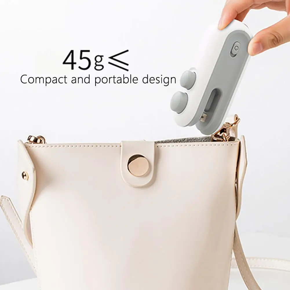 Mini Sealing Machine Portable Magnetic Mini Bag Sealer with Cutter Rechargeable Snacks Food Vacuum Heat Sealing Machine Resealer view 2