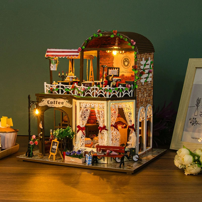 Kit di costruzione in miniatura in legno fai-da-te Case delle bambole Cottage del tempo di Raya con mobili Luce Casa Case delle bambole Amici Regali di compleanno