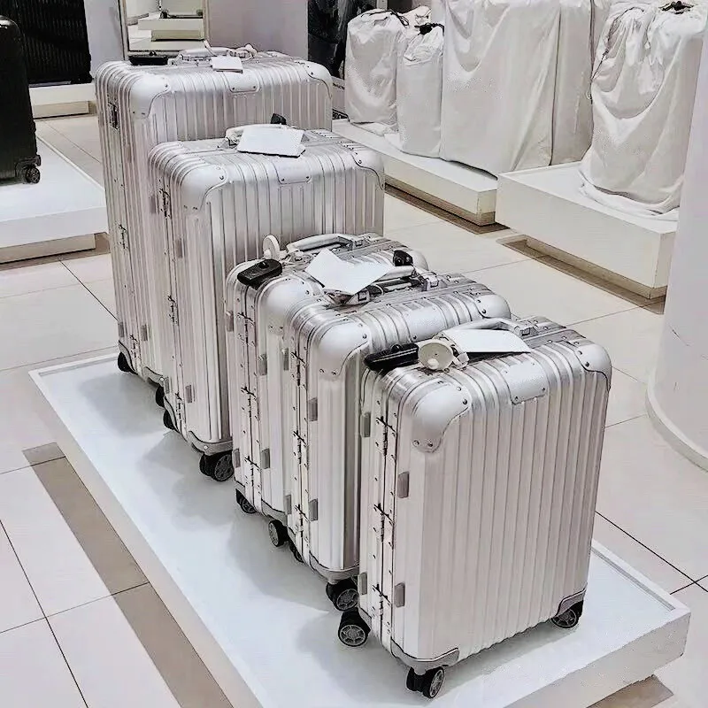 

Busin Travel Lage Aluminum Magnesium Alloy Carry-On Suitcase Universal Wheel Zipper Lo TSA M Fem Universal