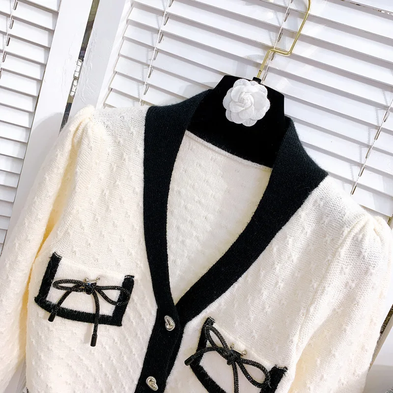 Autumn Design Sense Color Knitted Bow Decoration V-neck Long Sleeved Cardigan Sweater Women