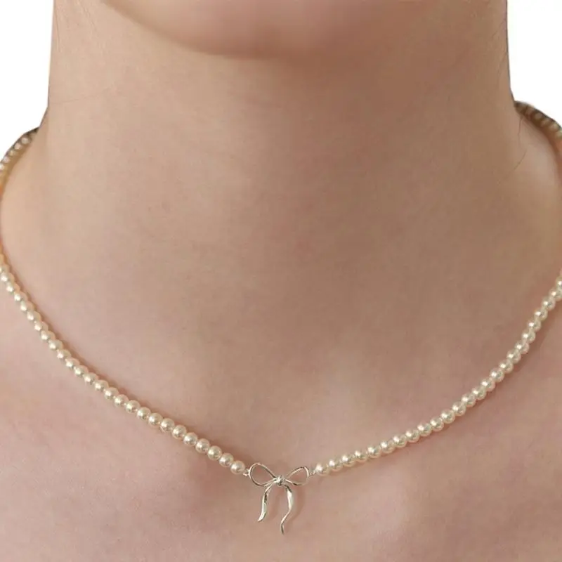 

634C Trendy Pearls Embellished Bowknot Tie Necklace With Gold or Silver Color Coating