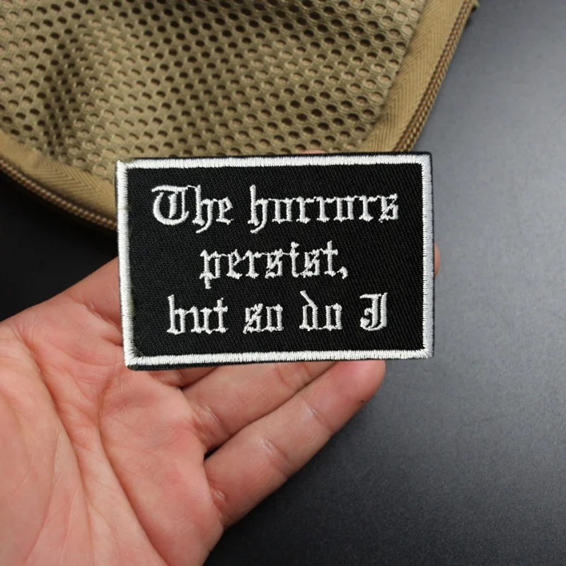 

"The Horrors Persist, But So Do I" Embroidery Patch on Clothes Morale Badge Tactical Humor Armband Hook Loop Backpack Sticker