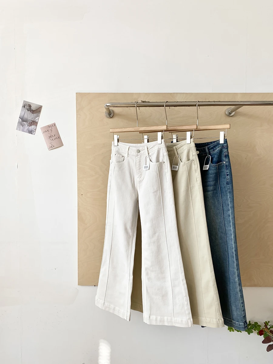 

Весенние шикарные белые джинсы с высокой талией, женские свободные расклешенные повседневные брюки с широкими штанинами в корейском стиле, модные и стройнящие.