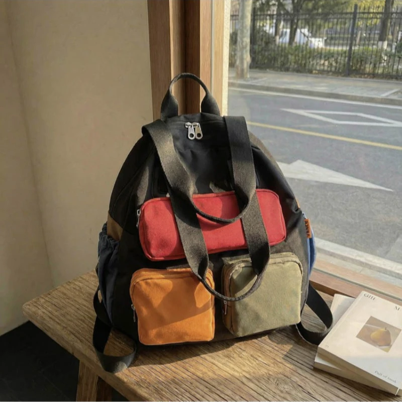 

Women's Diaper Bag Backpack with Trolley Sleeve Large Capacity Travel Convertible Shoulder Crossbody Bag