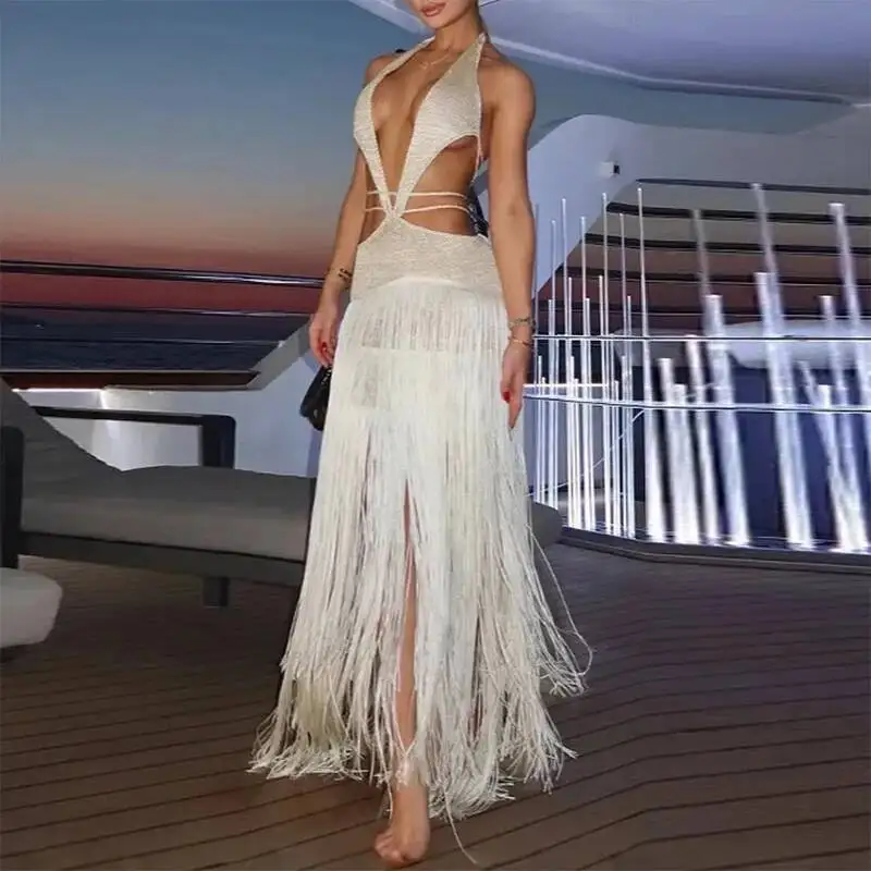 夏休みビーチマキシドレスセクシーなホルタータッセルボヘミアン女性春ソリッドバックレスレースアップロングドレスムヘール