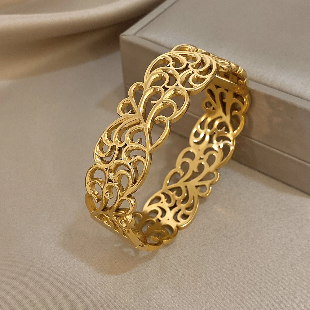 Freetry خمر الفولاذ المقاوم للصدأ الكفة واسعة سوار للنساء العصرية الذهب اللون الجوف خارج زهرة الإسورة هدايا مجوهرات مقاوم للماء