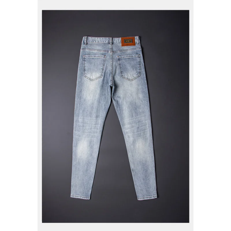 

Tiger head rhinestone print fashionable light luxury jeans for men 2025 new trendy brand slim fit small leg ripped pants