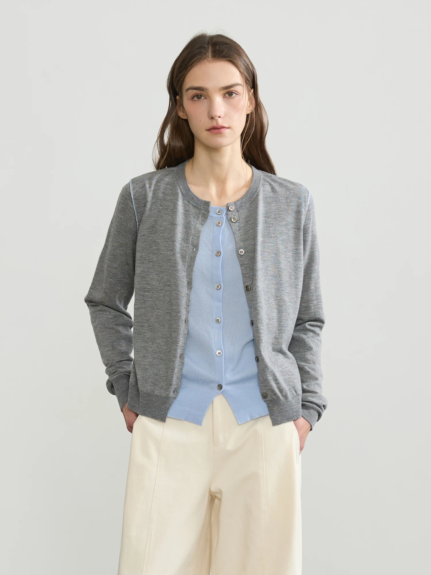 

Realistic Spring 2025 Women's Knitted Sweater Fake Two-Piece Cardigan Straight-Line Commute Style Pure Color Long Sleeve roun...