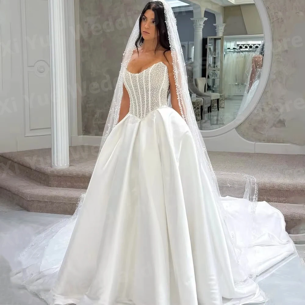 Graceful A Line Women's Sexy Strapless Sleeveless Beaded Wedding Dresses Vestido De Novia Bride Gowns Customized Robe De Mariée