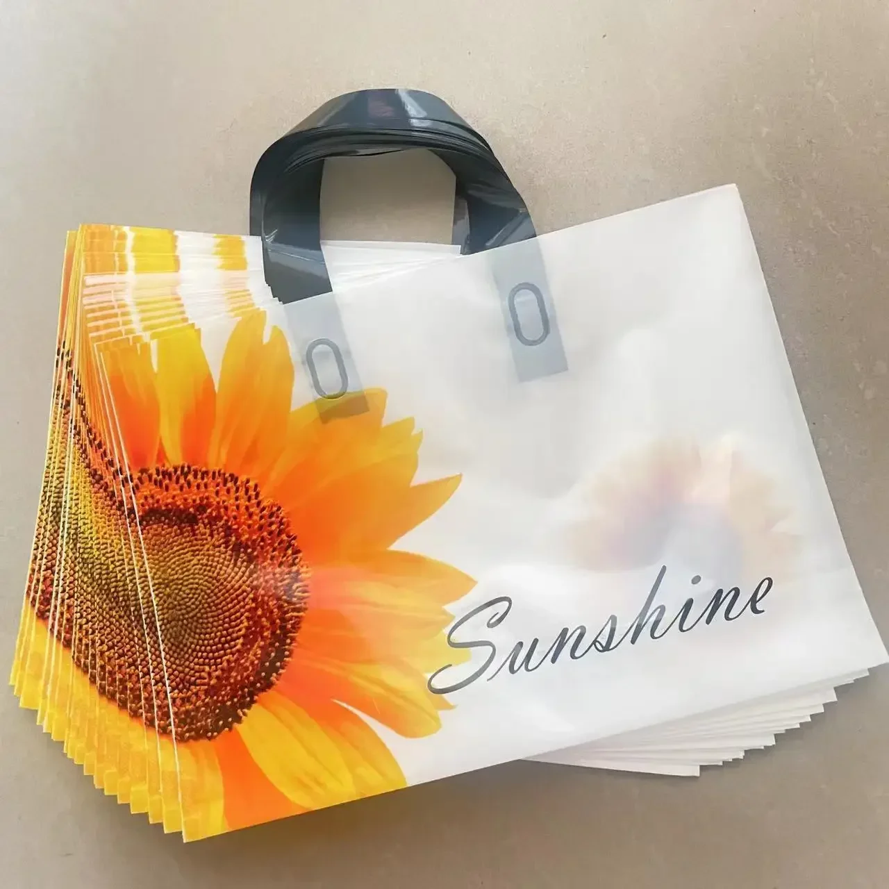 

50pcs 0.14mm Thick Sunflower Pattern Plastic Bag Cosmetic Handheld Shopping Bag Clothing Store Gift Packaging Pocket