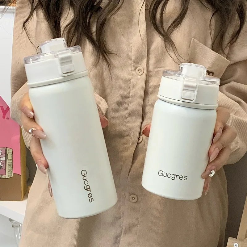 

Simple thermos cup with spring cover portable water cup with high profile horizontal tea separator cup with handle