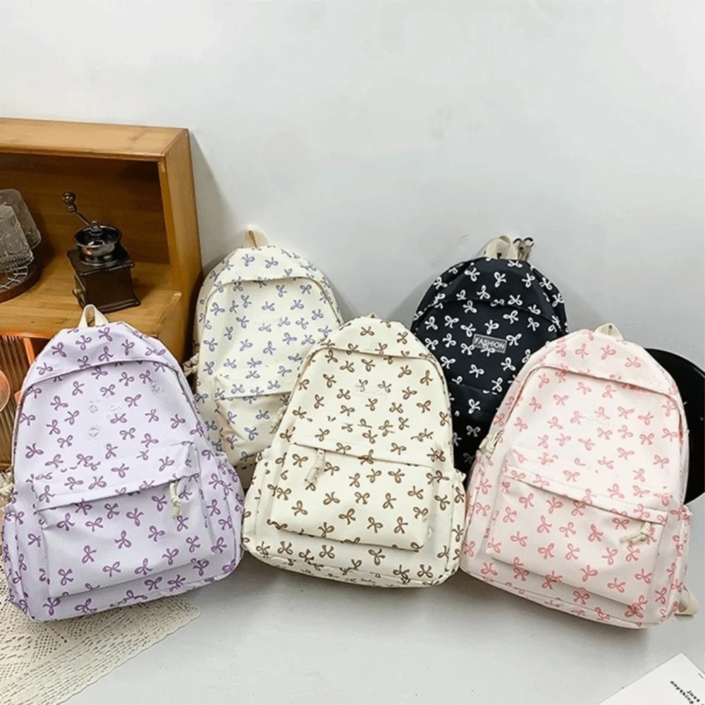 حقيبة ظهر من النايلون خفيفة الوزن ذات سعة كبيرة للطلاب حقيبة مدرسية حقيبة تخزين بحزام قابل للتعديل حقيبة كتف للمراهقين