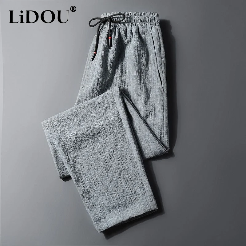 2023 Summer New Solid Color Elastic Waist Pockets Ankle Length Pants Man Drawstring Street Thin Style All-match Straight Trouser