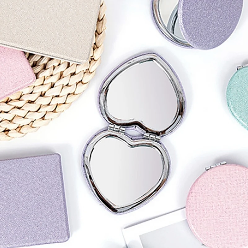 Espejos compactos portátiles de doble cara en forma de corazón, espejo de maquillaje plegable, tamaño de viaje, tocador de bolsillo de alta definición, 1 unidad