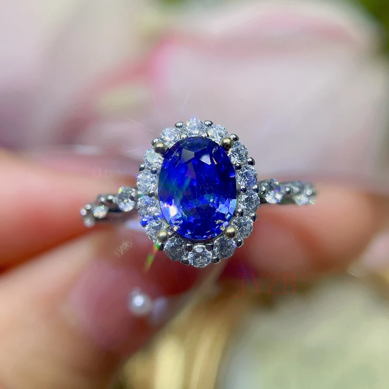 

Light luxury Tanzanite ring for women INS sterling silver niche design advanced sense diamond-inlaid ring opening temperament