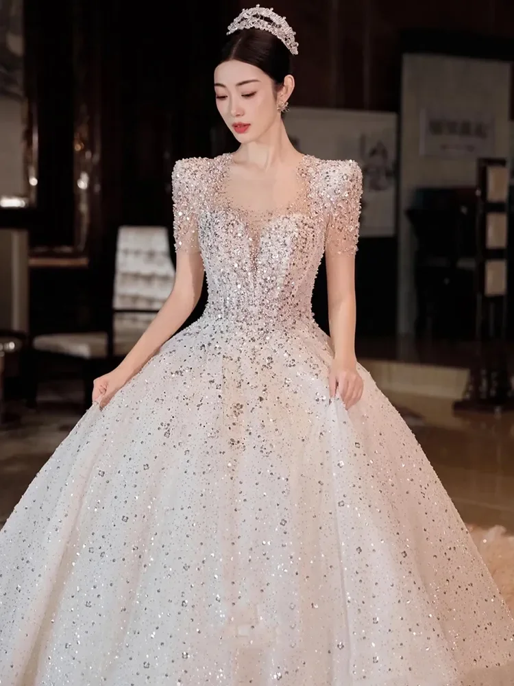 Customized 2026 Princess Dress Wedding Dress Round Neck Short Sleeved Mesh Sequin Bead Decoration Backless Lace Vestido De Novia