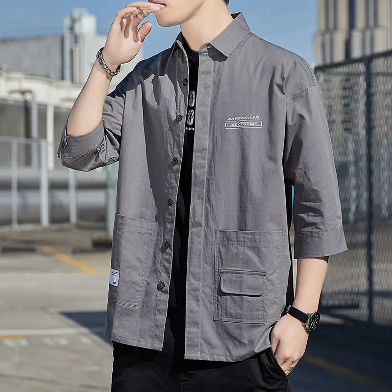 

Men's Shirt Three Quarter Sleeves Japanese Pure Cotton Korean Version The New Spring and Summer Tooling Work Loose Short Sleeve