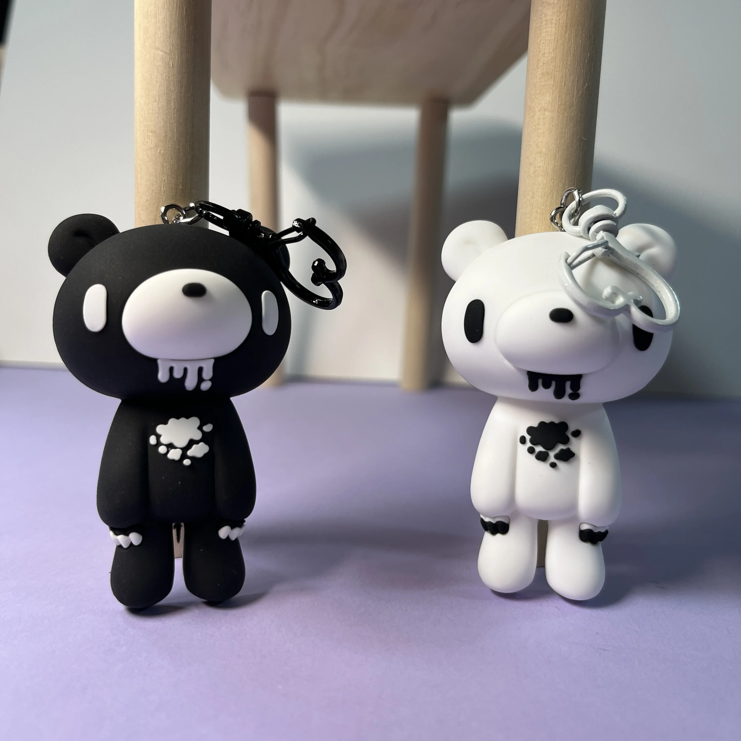 A high-end keychain in a minimalist black-and-white style, serving as a cool and sleek accessory to elevate your look.