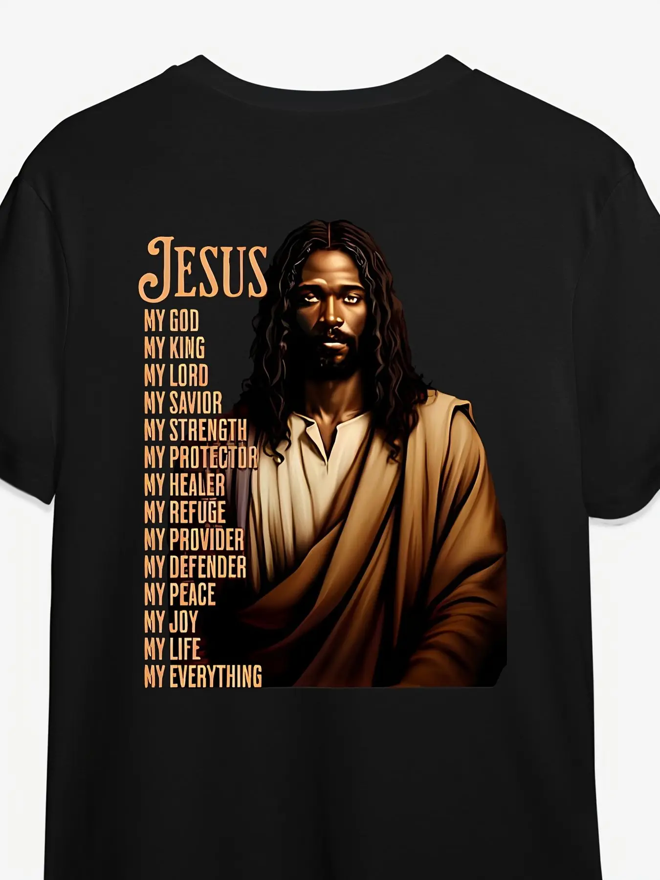 A black T-shirt with long hair illustration of a fashionable Jesus, decorated with a golden-brown religious title