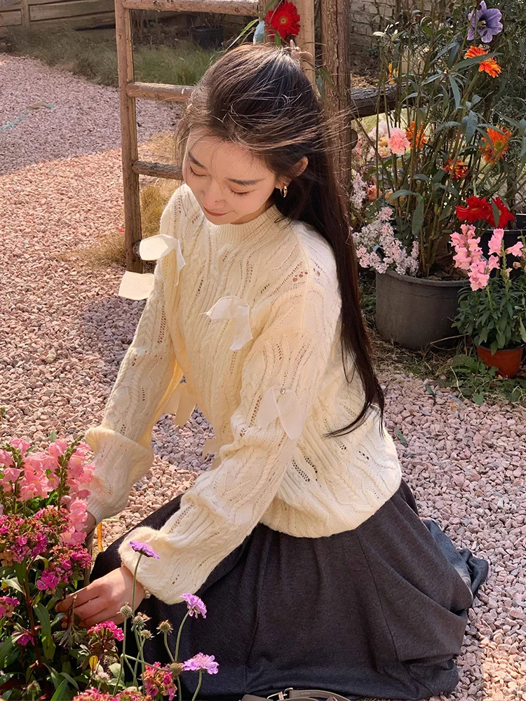 

OUDOEE Women's Knitted Hollow out Sweater Knot Design Spring 2026 Princ Sle Soft Acrylic Long Sve Top