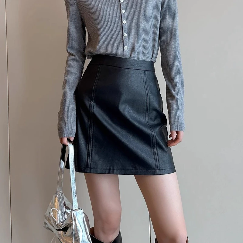 البساطة مكتب سيدة الخريف الشتاء المرأة الصلبة سستة الكورية موضة عالية الخصر قصيرة ضئيلة ألف خط بولي Leather الجلود الورك تنّورة ملفوفة