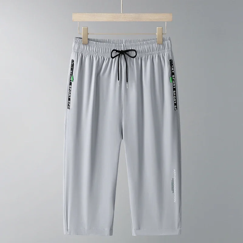 

Letter Print Zipper Pockets Shorts Men Summer Casual Calf Length Pants Fashion Hip Hop Ice Silk Sweatpants Male Loose Trousers