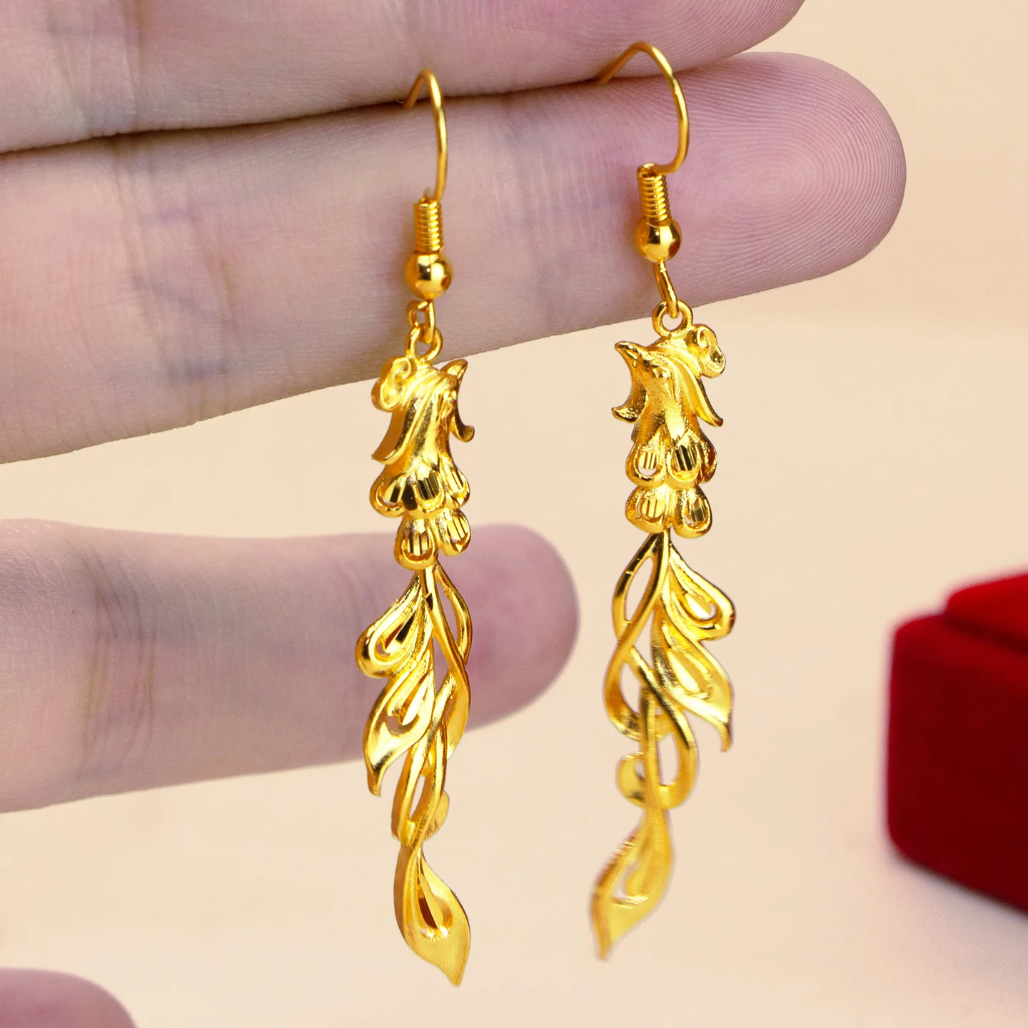 9999 gold phoenix and dragon tassel earrings - exuding a sense of sophistication, suitable for a vintage-style wedding