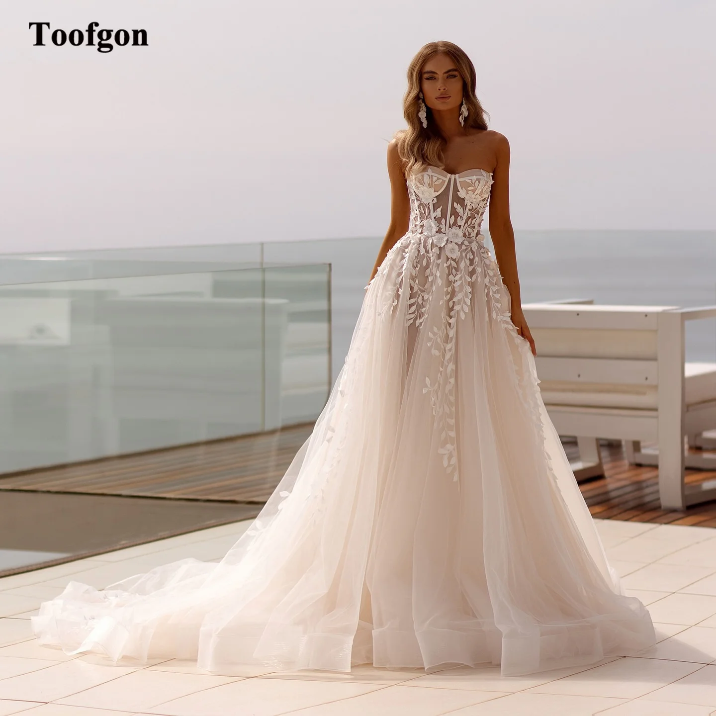 

Toofgon Appliques Lace Customized Wedding Dresses Bride Transparent Top Bones Bridal Gowns Formal Occasion Party Wedding Photos