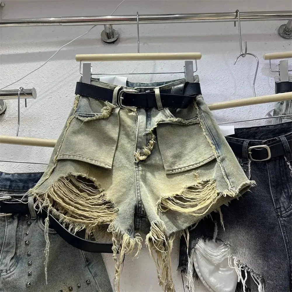 

European retro individual design sense high-waisted style ripped tassels fringed denim hot pants women's trendy A-line shorts