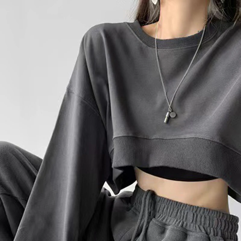 Koreańska moda krótkie bluzy damskie seksowne jednokolorowe luźne krótkie bluzki kobieta casualowe w stylu Streetwear swetry w dużych rozmiarach damskie