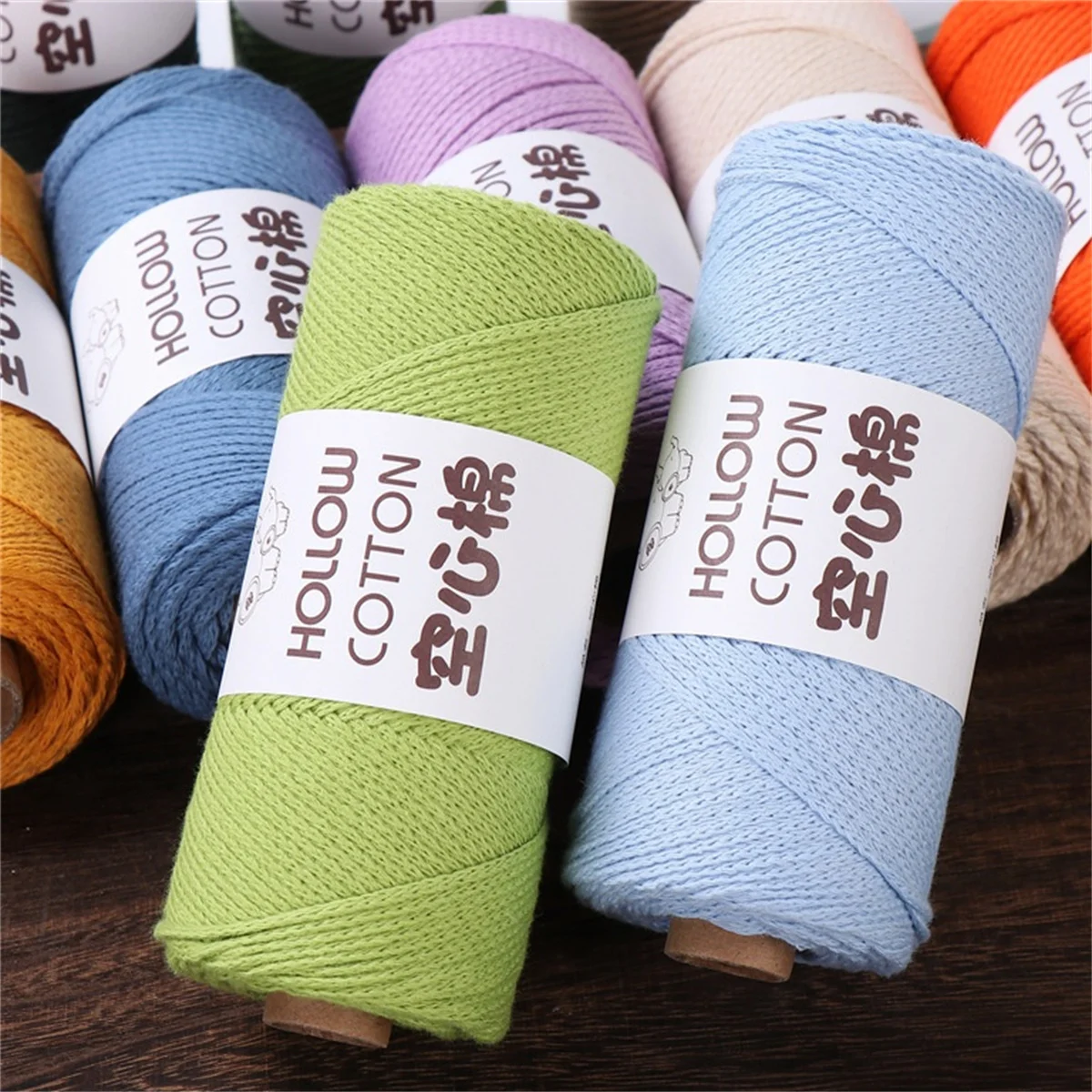 A Roll of 2mm Hollow Cotton Round Strand Yarn DIY Woven Round Rope is Used to Hook and Weave Hollow Cotton Thread for Bags