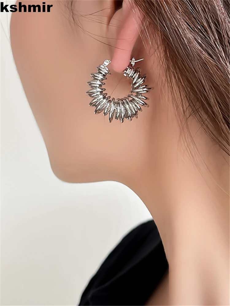 kshmir 2022 Fashion Runway Show New women's metal spring spiral earrings hollow loop  earrings