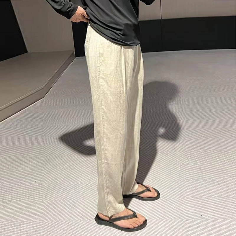 Pantaloni di lino tinta unita da uomo alla moda Pantaloni di lino dritti larghi drappeggiati casual autunnali Pantaloni di lino vintage da uomo streetwear
