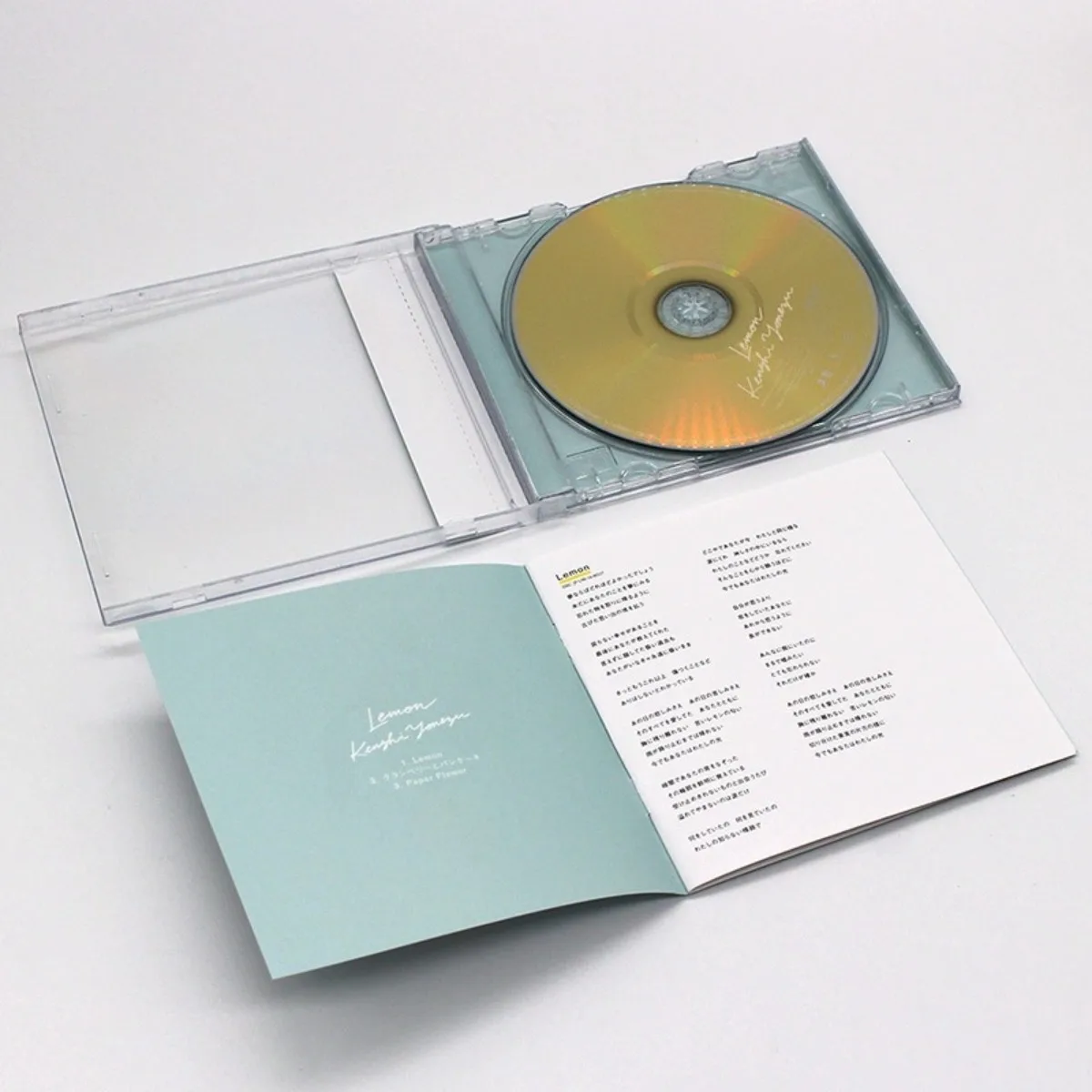 قرص مضغوط لألبوم Kenshi Yonezu مع كتاب كلمات - يتضمن "ليمون"، محيطية قابلة للجمع، سجل موسيقي عالي الدقة للمعجبين #2