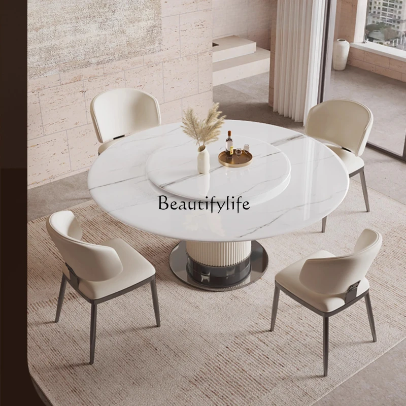 

Italian light luxury marble dining table, household round modern simple luxury stone