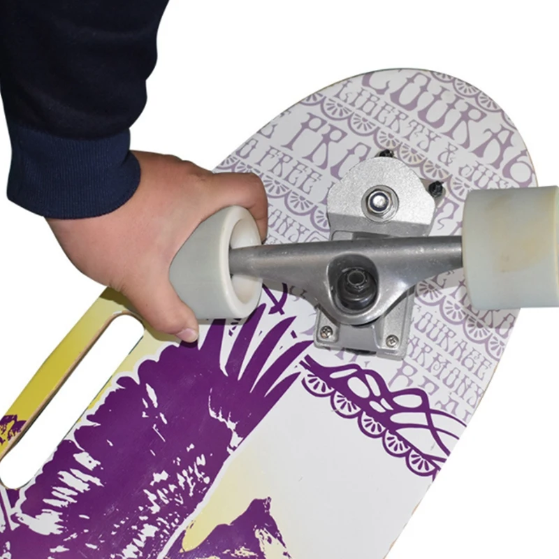 Neuankömmling Surf Skate Trucks Legierung 7-Zoll-Land-Surfbrett Skateboard Halterung Basis schwarz c7 Brücke (zufällige Farbe)