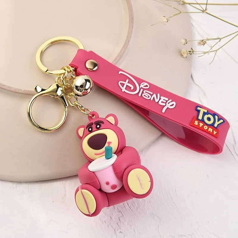 Kawaii عروسة كارتون الطنانة الخفيفة الفراولة الدب المفاتيح ثلاثة عيون مضحك دمية حقيبة