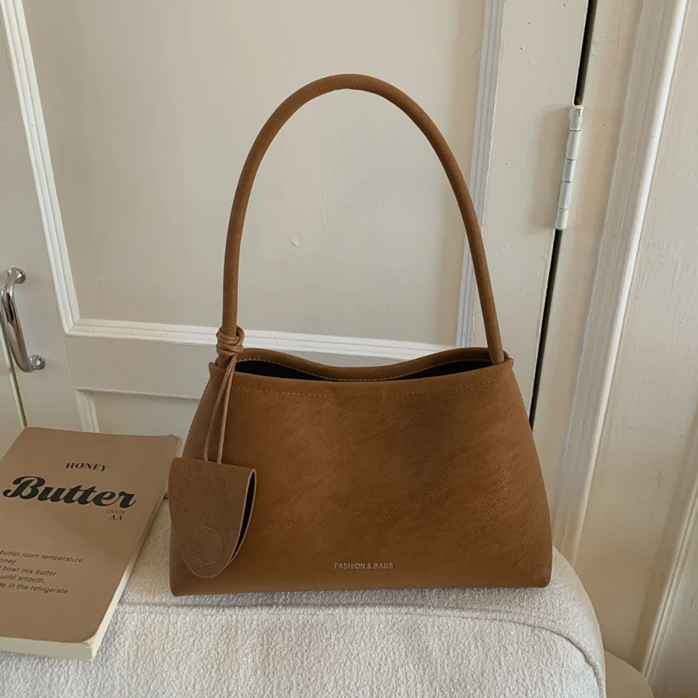 Korean Ins niche design armpit bag, simple trendy bags, single shoulder frosted fashionable mother and child bag, versatile hand