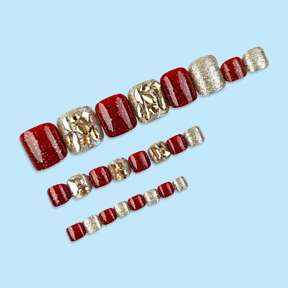 24 Stück superglänzende Zehennägel zum Aufdrücken mit Diamant-Design. Glänzende rote künstliche Zehennägel. Tragbare, abnehmbare künstliche Zehennägel für Frauen