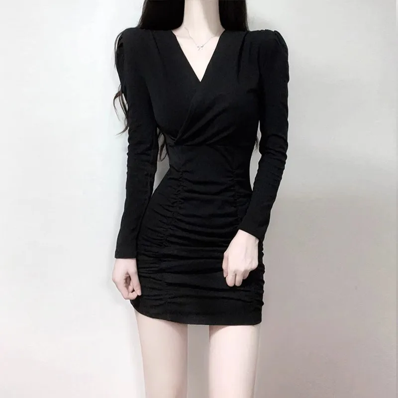 Black V-neck tight fitting lady style dress that looks slimmer  with a buttocks wrapped inside and a bottom skirt