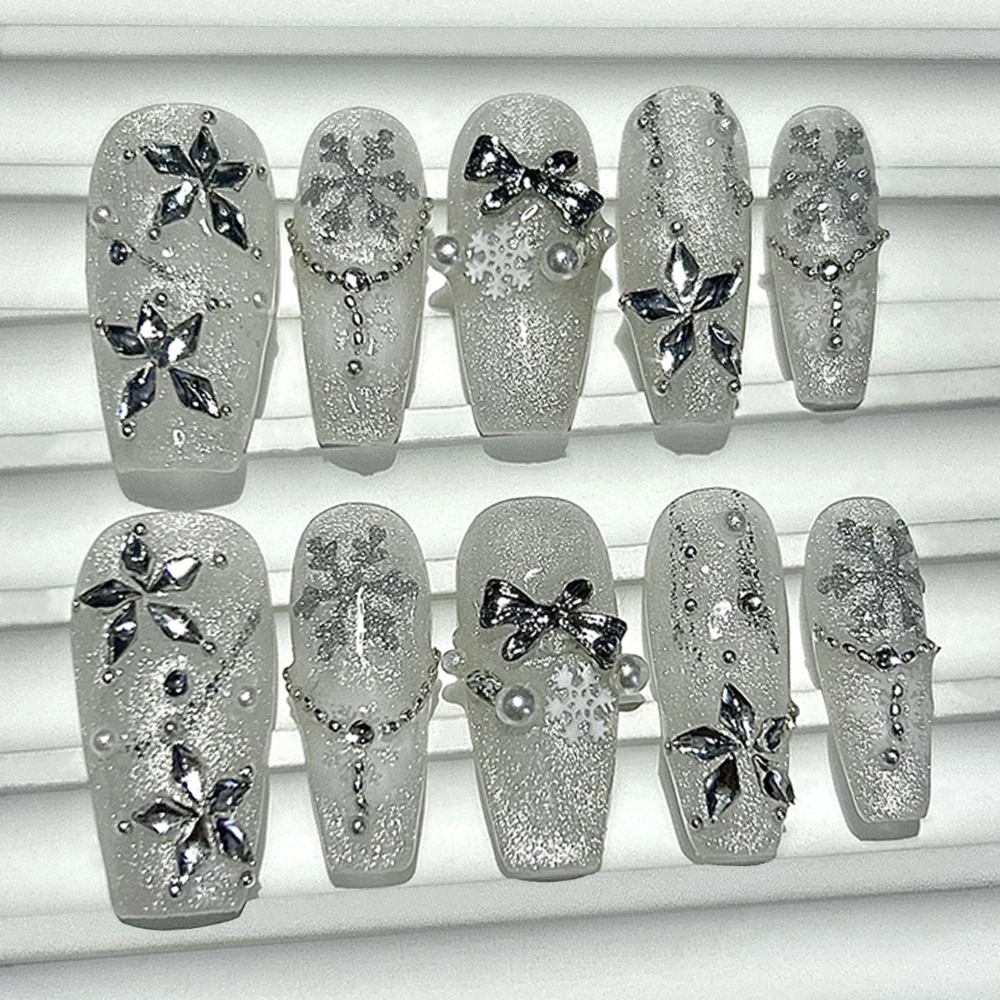 

Белоснежка Кэрол Зима Ручная работа Пресс на ногтях Белый Рождественский кошачий глаз Накладные ногти Снежинка Звезда Лук Рождественская елка Нейл-арт